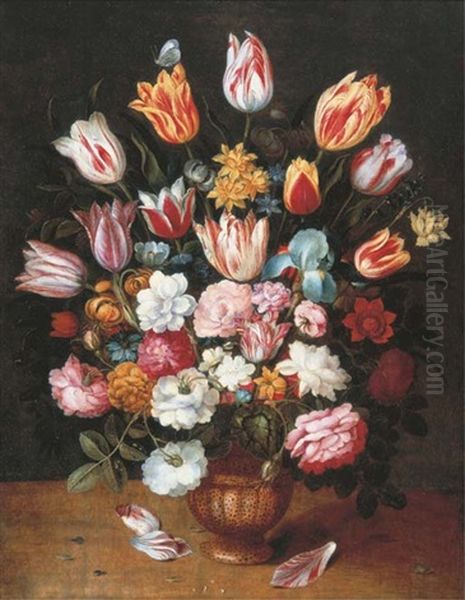 Tulips, Daffodils, Roses, An Iris And Other Flowers In A Pottery Vase On A Ledge by Osias Beert the Younger