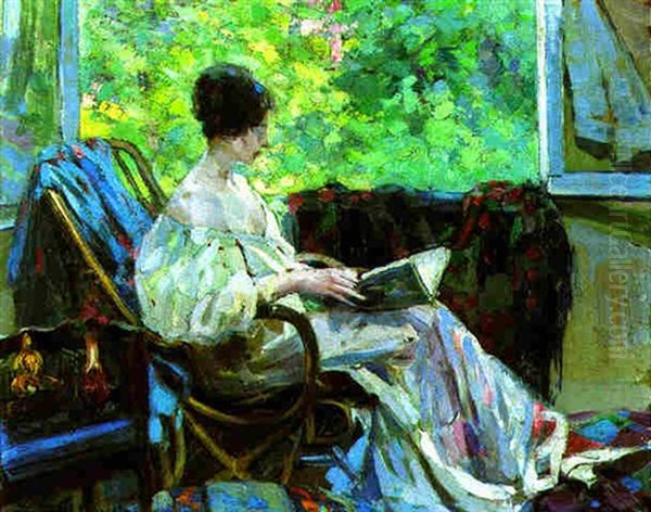 A Woman Reading By The Afternoon Light by Ulisse Caputo