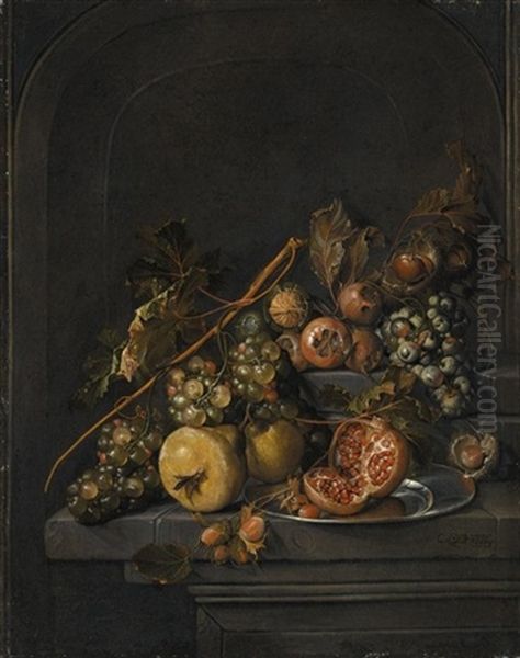 Still Life Of Fruit And Nuts On A Stone Ledge, Including Grapes, Pears, Horse Chestnuts, Walnuts, Hazelnuts And An Open Pomegranate On A Pewter Dish by Cornelis De Heem