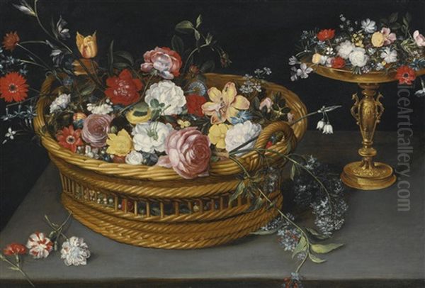 Still Life Of Flowers In A Basket And Flowers On A Gilt Cup, Both Resting On A Ledge by Philippe de Marlier