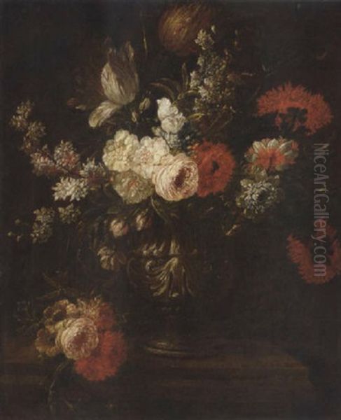 Parrot Tulips, Narcissi, Roses, Chrysanthemums And Other Flowers In An Urn On A Ledge by Mario Nuzzi