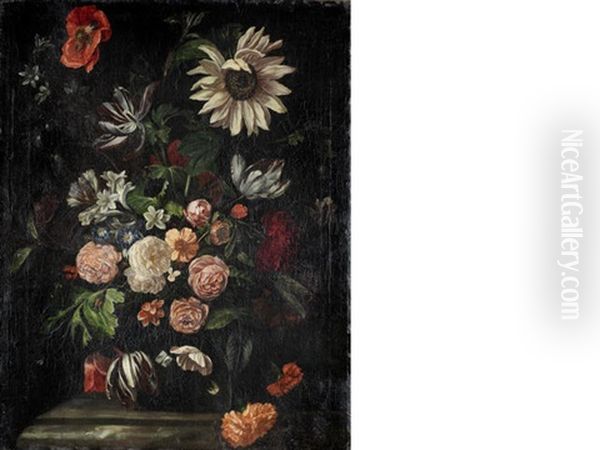 Roses, Tulips, Poppies, A Sunflower And Other Flowers In A Glass Vase On A Stone Ledge by Ernst Stuven