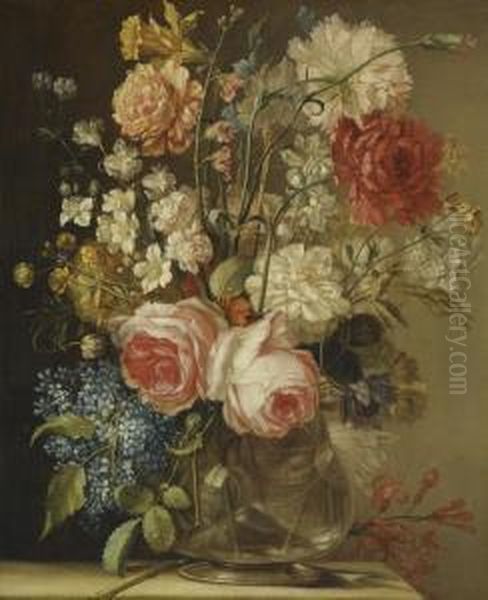 A Still Life With Roses, A Daffodil And Other Flowers In A Glass Vase On A Stone Ledge Oil Painting by Ludovico Stern