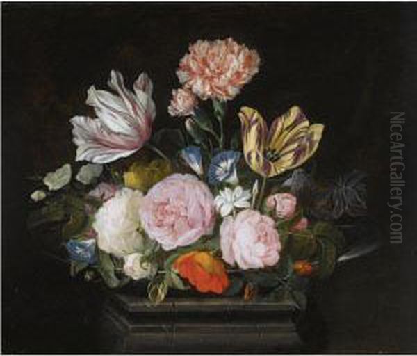 A Still Life Of Parrot Tulips, Roses, Carnations, Morning Glory Andother Flowers In A Silver Dish On A Stone Pedestal Oil Painting by Jasper van der Lanen