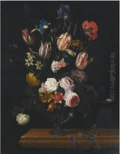 A Still Life Of Tulips, Roses, Irises And Other Flowers In A Glassvase Oil Painting by Gerrit Van Giessen