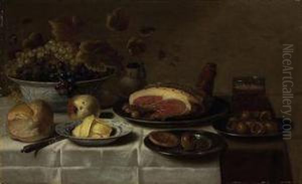 White And Blue Grapes In A 'kraak' Porcelain Bowl, A Loaf Of Bread,a Knife, Butter On A Porcelain Plate, A Biscuit And Medlar On Asilver Plate, A Mug Of Beer, A Joint Of Ham On A Third Silverplate, Oil Painting by Floris Gerritsz. van Schooten