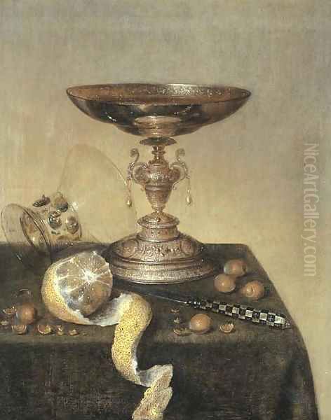 A silver tazza, an upturned roemer, a partly-peeled lemon, a knife and hazelnuts on a draped table Oil Painting by Maerten Boelema De Stomme