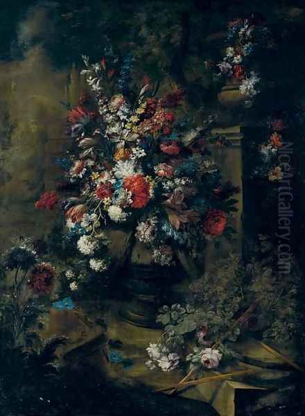 Roses, tulips, hydrangea and other flowers in an urn, a second urn on a pedestal, a landscape beyond Oil Painting by Andrea Belvedere