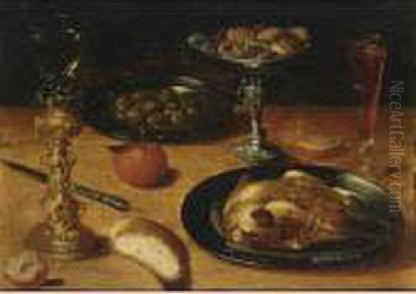 A Still Life With A Roast 
Chicken And Olives On Pewter Plates, A Roemer In A Silver-gilt Holder, 
An Orange, A Tazza With Cookies, A Wineglass, Together With A Knife And 
Bread, All On A Wooden Table Oil Painting by Osias, the Elder Beert