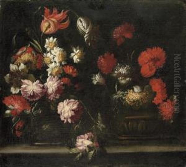 Tulips, Carnations, Roses And Other Flowers In Two Vases On A Stone Ledge Oil Painting by Margherita Caffi