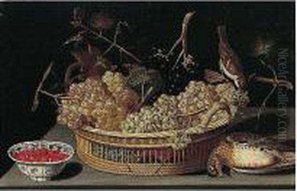 A Still Life Of A Basket Of 
Grapes, With A Sparrow And A Thrush And Fraises-de-bois In A 
Blue-and-white Porcelain Bowl Upon A Table Top Oil Painting by Francesco Codino