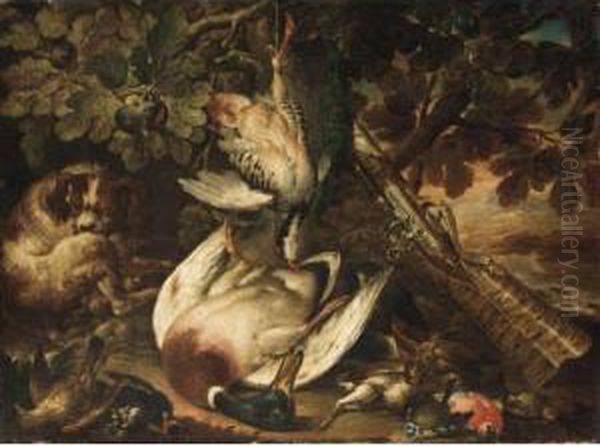 A Spaniel Guarding Over A Duck, A
 Partridge And Smallbirds, Together With A Musket Resting Against A Tree Oil Painting by Baldassare De Caro