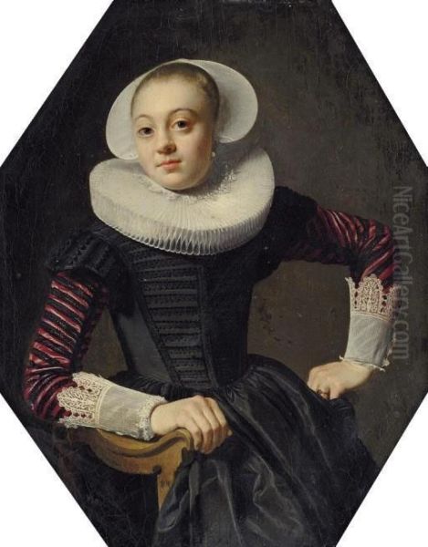 Portrait Of A Lady, Seated 
Three-quarter-length, In A Black Dress With Red Slashed Sleeves, Lace 
Cuffs And A Ruff Oil Painting by Thomas De Keyser