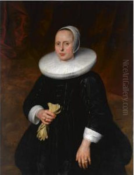 A Portrait Of A Lady, Standing 
Three-quarter Length, Wearing A Black Dress With A Mill-stone Collar And
 A White Bonnet, Holding Gloves Oil Painting by Thomas De Keyser