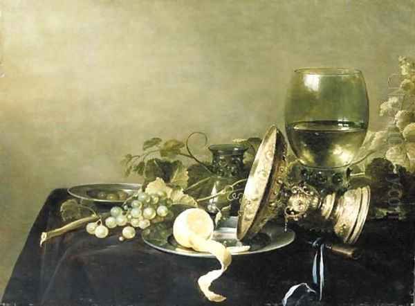 A Vanitas still life with a partially peeled lemon, grapes and olives on pewter dishes, an overturned gold tazza, an upturned glass Oil Painting by Pieter Claesz.