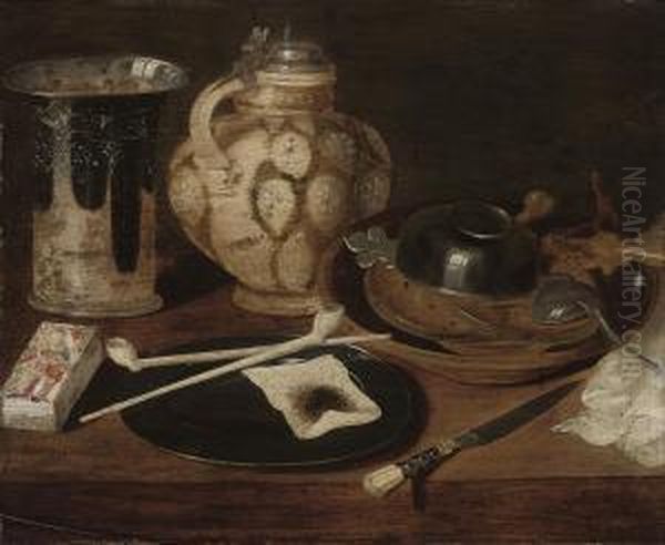 Pipes And Tobacco On A Pewter 
Plate, A Silver Mounted Rhinish Pitcher, A Deck Of Cards, And An Ecuelle
 And Various Other Vessels On A Wooden Table Oil Painting by Georg Flegel