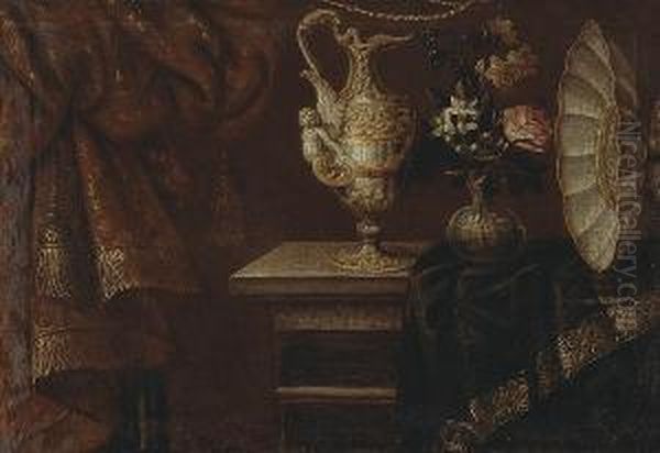 A Still Life With An Ewer, 
Footed Basin And Flowers In A Glass Vase On A Partially Draped Table Oil Painting by Antonio Gianlisi The Younger