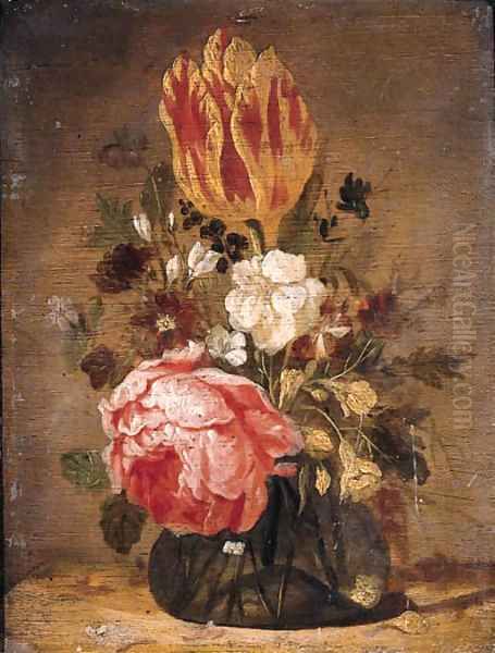 A tulip, a rose, a violet and other flowers in a glass vase on a wooden table Oil Painting by Jacques de Claeuw