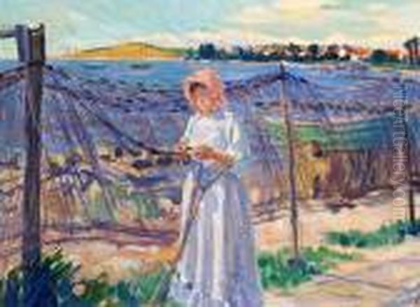 A Young Girl Mending The Fishing Nets On The Beach Oil Painting by Peter Marius Hansen