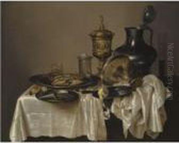 A Monochrome Still Life With A 
Silver-gilt Goblet, An Overturnedsilver Tazza, A Pewter Flagon, Glasses 
And A Salt Cellar, With Acrab, Oysters, Nuts, A Knife And A Peeled Lemon
 On A Table Drapedwith A White Cloth Oil Painting by Willem Claesz. Heda