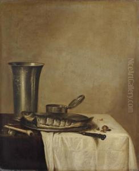 A Herring On A Pewter Platter, 
An Engraved Silver Tumbler, And A Pipe On A Partly-draped Table Oil Painting by Willem Claesz. Heda