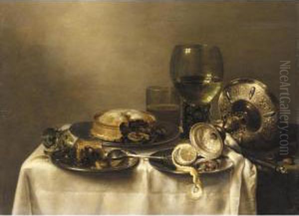 A Still Life Of An Overturned 
Silver Tazza, A Roemer With White Wine, A Glass Beaker With Beer, And 
Three Pewter Plates With A Partly Peeled Lemon And Partly Eaten Pies, 
All On A Table Partly Draped With A White Cloth Over A Green Cloth Oil Painting by Willem Claesz. Heda