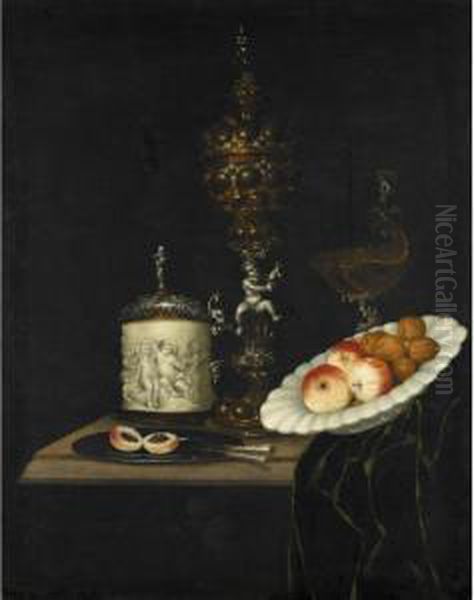 A Still Life Of Apples And 
Walnuts In A Ceramic Dish, An Elaborate Silver And Gilt Cup And Cover, A
 Silver And Gilt Nautilus Shell Tazza, A Silver Mounted Ivory Tankard, 
Knives And A Peach On A Salver, All Upon A Table Partly Draped With A 
Green C Oil Painting by Johann Georg (also Hintz, Hainz, Heintz) Hinz