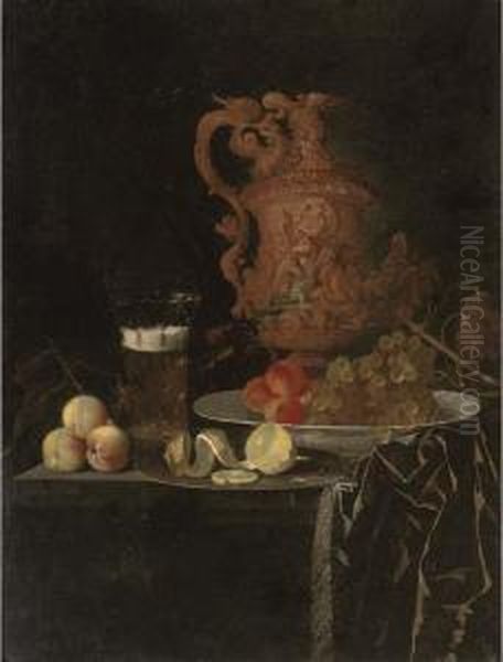 A Gilt Ewer, A Roemer Of Beer, 
Peaches, A Partly-peeled Lemon On Apewter Tray, And Grapes And Peaches 
In A Porcelain Dish On Apartly-draped Table Oil Painting by Johann Georg (also Hintz, Hainz, Heintz) Hinz