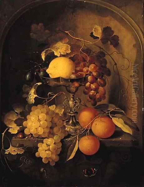 A lemon, grapes and plums on a tazza, with oranges, grapes and a hazelnut with a snail and a butterfly at a feigned sculpted stone niche Oil Painting by Laurens Craen