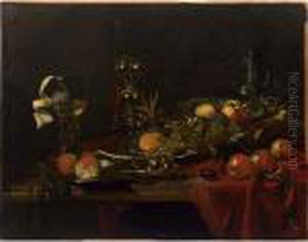 A Sumptuous Still Life Of Peaches On A 
Kraak
 Porcelain Dish,apples, A Mandarin On A Silver Dish And Three Apricots On A 
Puntschotel,
 With A Roemer, A Silver Gilt Goblet And An Earthenware Jug, All On A Marble Table, Draped With A Red Cloth Oil Painting by Willem Kalf