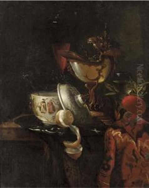 A Nautilus Cup, An Oriental Bowl On A Silver Tray And Glasses Ofwine On A Table Oil Painting by Willem Kalf