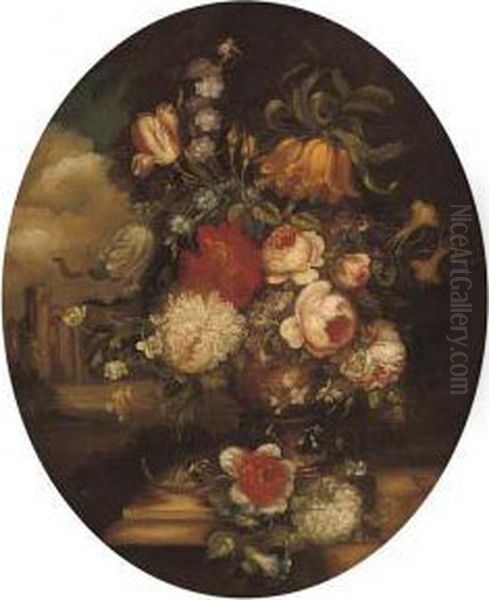 Roses, Camelias, Tulips And 
Other Flowers In An Urn, On A Stoneledge, A Classical Building Beyond Oil Painting by Giuseppe Lavagna