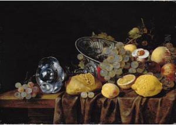 A Still Life Of Lemons, Grapes 
And Peaches, With A Bread Roll And A Silver Pokal On A Partly Draped 
Table Oil Painting by Carstiaen Luyckx