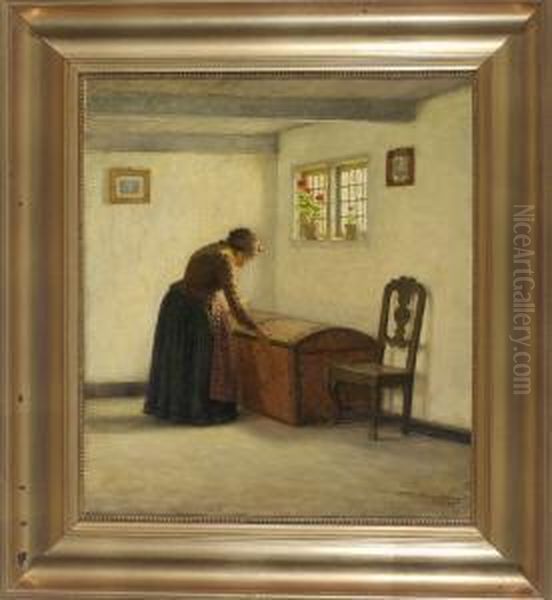 Frau An Einer Truhe Im Interieur Oil Painting by Valdemar Magaard