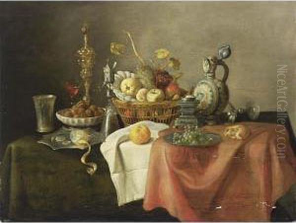 A Sumptuous Still Life With A 
Silver-gilt Beaker, A Lemon On A Silver-gilt Pointed Dish, Walnuts In A 
Porcelain Bowl, A Silver Gilt Cup With Cover, A Silver-gilt Mill Glass, A
 Quince, An Apple, A Peach, Grapes, And Oranges In A Basket Together 
Wit Oil Painting by Cornelis Mahu