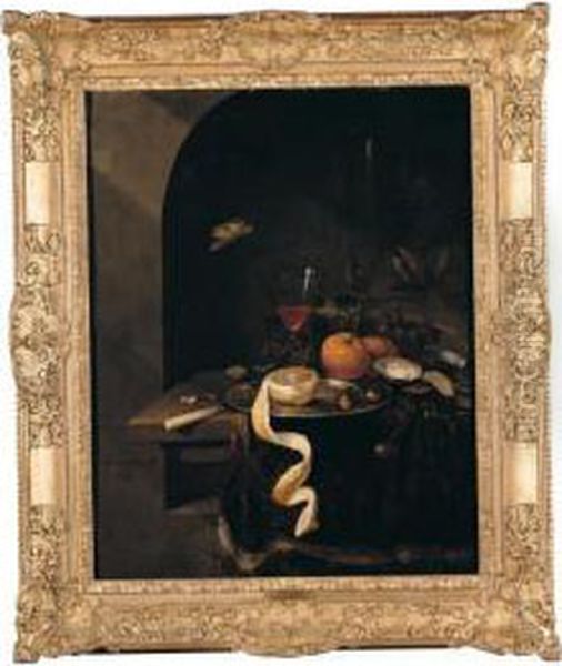 Still Life Of A Wine Glass With 
Oranges, Grapes, Oysters, Nuts And A Peeled Lemon Upon A Pewter Plate, 
Arranged On A Ledge Draped With A Brown Cloth Within A Stone Niche Oil Painting by Jan Mortel