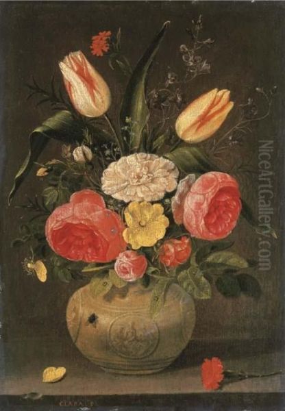 Roses, Tulips, Carnations And 
Other Flowers In A Stoneware Vase With Ornamental Relieves On A Stone 
Ledge Oil Painting by Clara Peeters