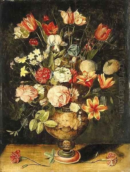 Tulips, irises, roses, carnations, lilies, narcissi and other flowers in a sculpted urn on a table Oil Painting by Andries Daniels or Danielsz