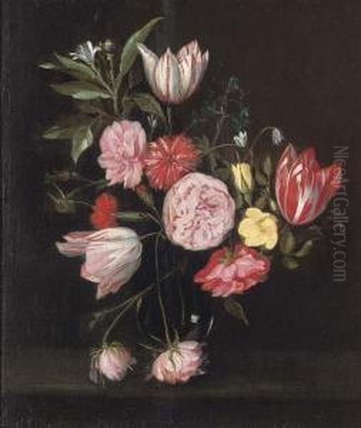 Parrot Tulips, Roses, Carnations And Other Flowers In Glass Vase On A Stone Ledge Oil Painting by Daniel Seghers