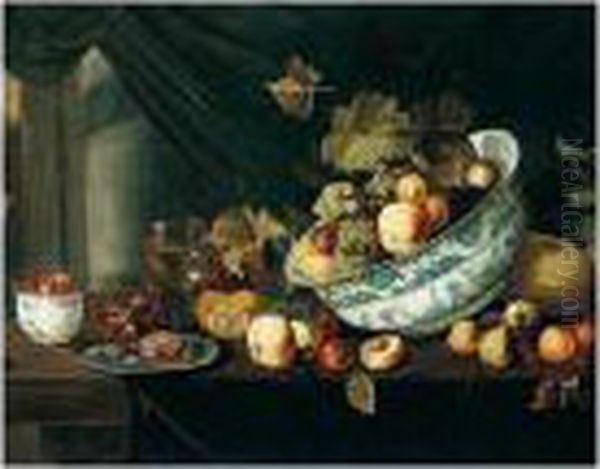 Still Life With Fruit Tumbling From A Porcelain Bowl, On A Wooden Table Oil Painting by Michiel Simons