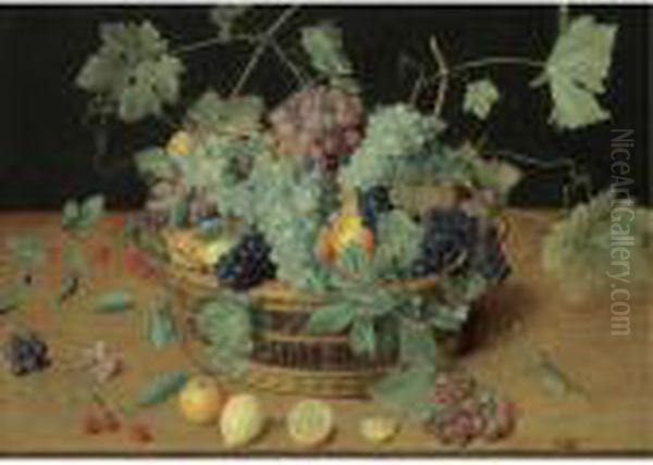 A Still Life With Fruit In A 
Basket, Including Bunches Of Grapes And Lemons, Cherries And Oranges On 
The Wooden Table Beneath Oil Painting by Isaak Soreau