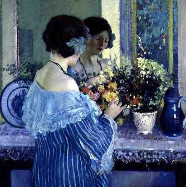 Girl in Blue Arranging Flowers Oil Painting by Frederick Carl Frieseke