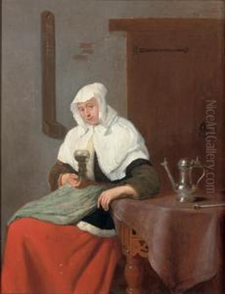 A Woman Seated At A Table, Holding A 'roemer' Oil Painting by Quiringh Gerritsz. van Brekelenkam