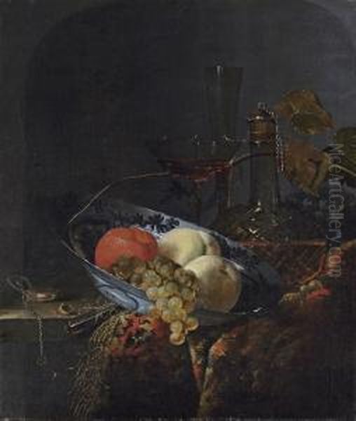 Grapes, Peaches And An Orange In
 A Porcelain Bowl, With A Watch,nuts, A Knife, A Glass Decanter, 
Wine-glasses, Grapes And A Carpeton A Wooden Table Oil Painting by Barend or Bernardus van der Meer