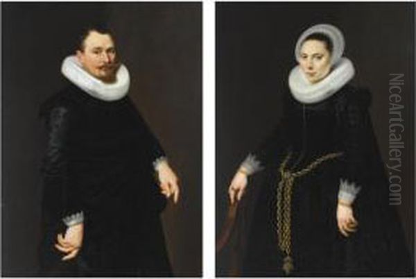 A Portrait Of Pieter Merchijs 
(1582-before 1628), Aged 39, Standing Three-quarter Length, Wearing An 
Elaborate Black Suit With White Lace Cuffs And A Mill-stone Collar, 
Holding A Hat; A Portrait Of His Wife, Maria Florianus (born 1600), Aged
 22, S Oil Painting by Cornelis van der Voort