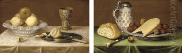 Lemons In An Earthenware Dish, A
 Silver Gilt Goblet, A Pewter Plate On A Draped Table; And An 
Earthenware Tankard, A Bread Roll, A Pewter Dish Of Hazlenuts And Cheese
 On A Draped Table Oil Painting by Jacob Fopsen van Es