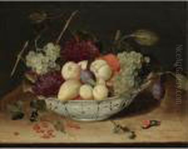 Still Life With Grapes, Peaches,
 Plums And Other Fruit In A Blue And White Porcelain Bowl, Redcurrants 
And Hazelnuts Scattered On The Wooden Ledge Below by Jacob van Hulsdonck