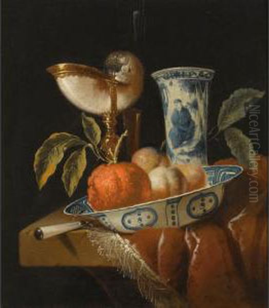 A Still Life With An Orange And 
Peaches In A Porcelain Wan-li Bowl, A Nautilus Cup, A Chinese Porcelain 
Vase And A Knife, All On A Stone Table Draped With A Red Velvet Cloth Oil Painting by Jacob Cornelisz. Van Oostsanen