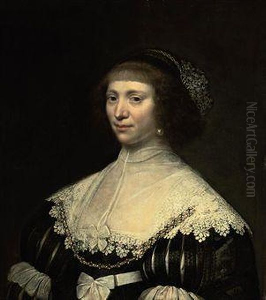 Portrait Of A Lady, Half-length, In A Black Dress With Lace Trimand Pearl Ornaments Oil Painting by Jan Anthonisz Van Ravesteyn