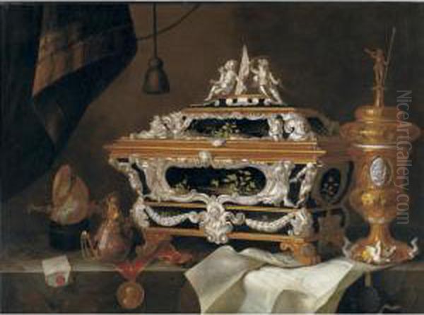 Still Life With An Elaborate 
Silver And Black Lacquer Casket, A Gilt Cup And Cover, A Teapot, A 
Letter, A Medallion, Nautilus Cup And A Watch All On A Ledge Oil Painting by Pieter Gerritsz. van Roestraten